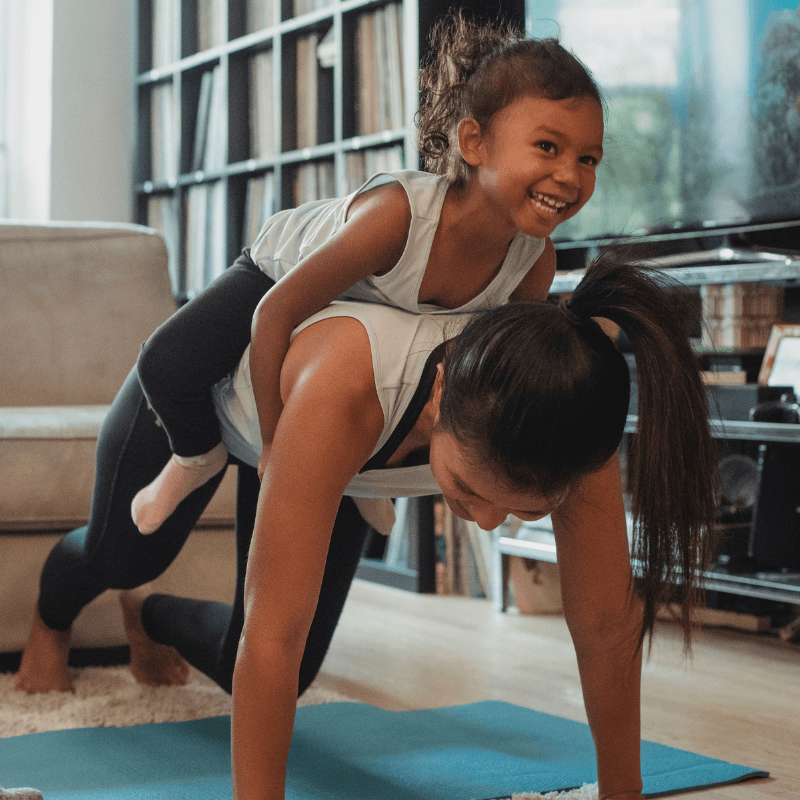 Mom and daughter working out